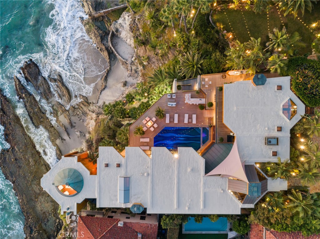 Aerial view of the oceanfront estate above Victoria Beach at 100 Rockledge Road, Laguna Beach Aerial view of the oceanfront estate above Victoria Beach at 100 Rockledge Road, Laguna Beach