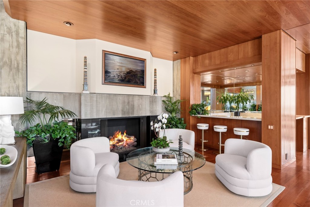 Oceanfront living room with a fireplace at 100 Rockledge Road, Laguna Beach Oceanfront living room with a fireplace at 100 Rockledge Road, Laguna Beach