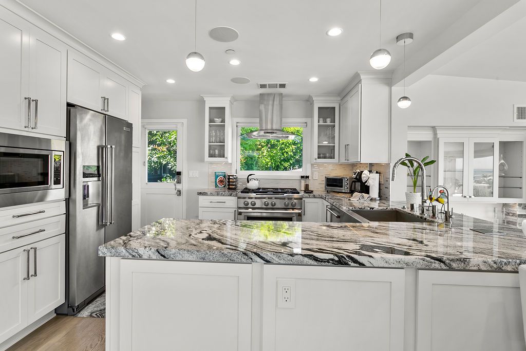 Remodeled kitchen with granite island at 166 Fairview St, Laguna Beach Remodeled kitchen with granite island at 166 Fairview St, Laguna Beach