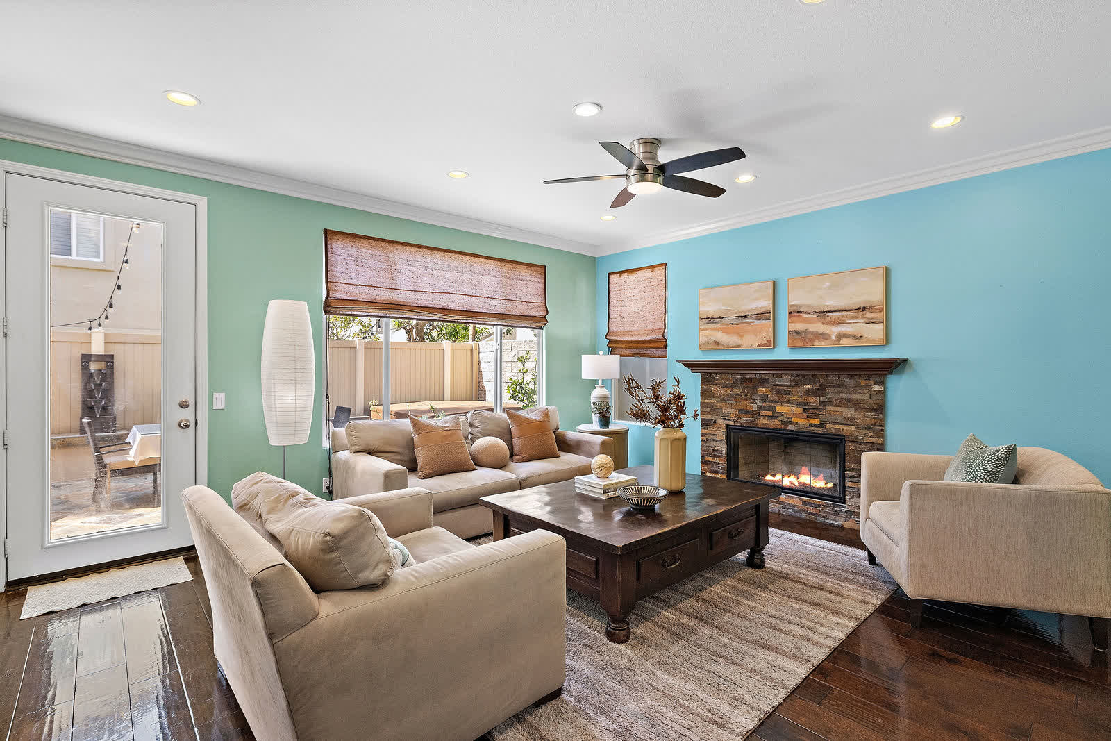 Family room with a stone gas fireplace at 5 Lyon Ridge, Aliso Viejo