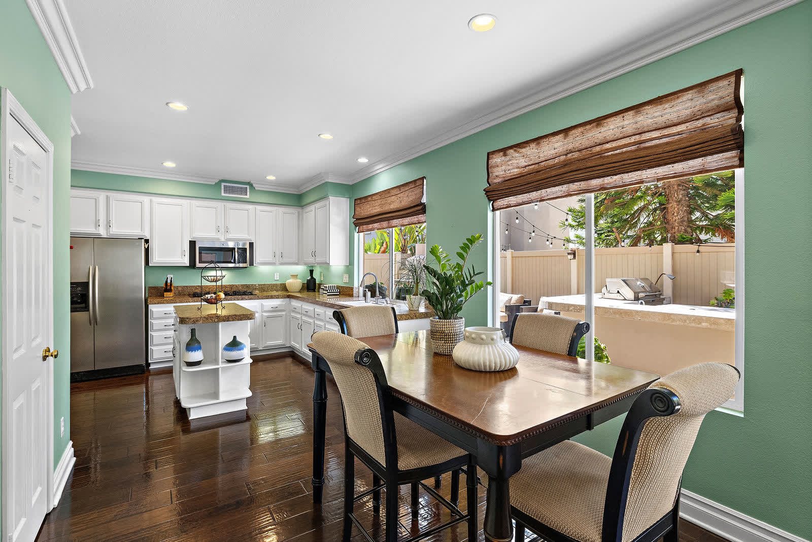 Breakfast table beside the kitchen island at 5 Lyon Ridge, Aliso Viejo