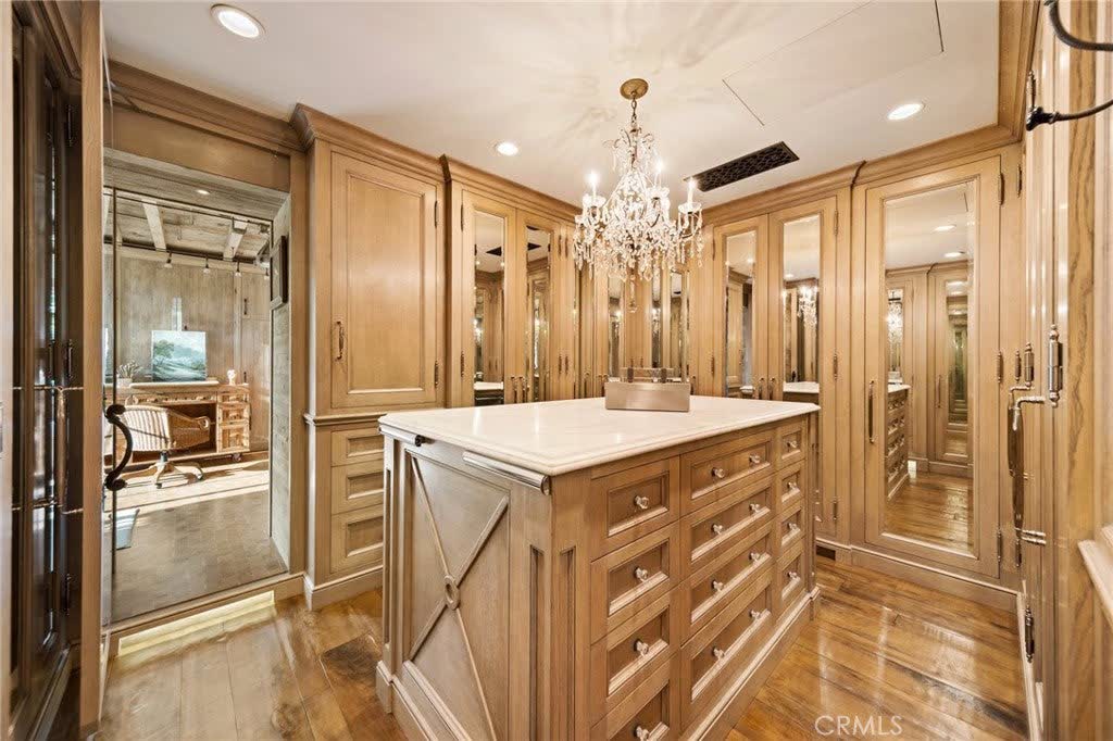 Walk-in closet with built-in cabinetry at 15 Montage Way, Laguna Beach Walk-in closet with built-in cabinetry at 15 Montage Way, Laguna Beach