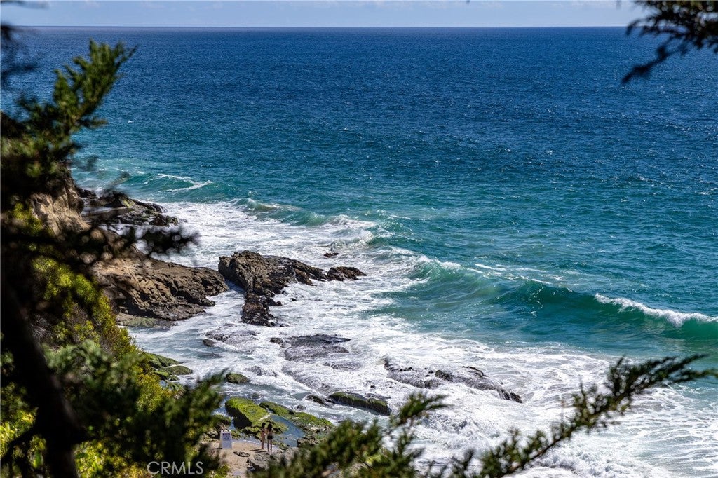 Surf over the rocks below the bluff at 32229 Coast Hwy, Laguna Beach Surf over the rocks below the bluff at 32229 Coast Hwy, Laguna Beach