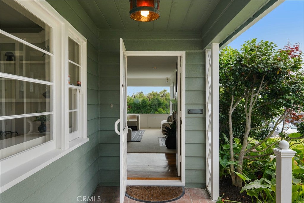 Painted entry porch with the front door open at 499 Legion, Laguna Beach Painted entry porch with the front door open at 499 Legion, Laguna Beach
