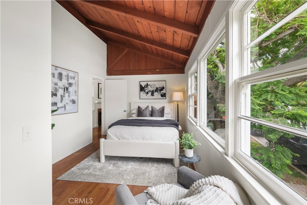 Guest cottage bedroom with a wood-paneled ceiling at 499 Legion, Laguna Beach Guest cottage bedroom with a wood-paneled ceiling at 499 Legion, Laguna Beach