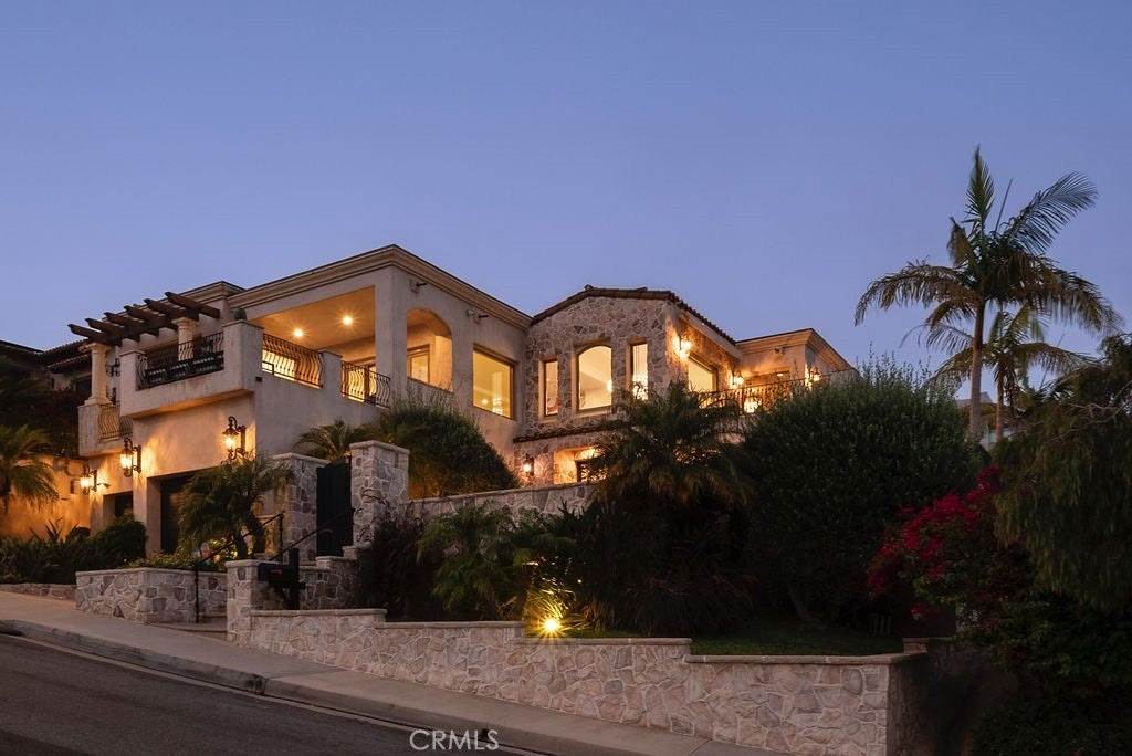 Front elevation at twilight at 740 Bolsana Drive, Laguna Beach