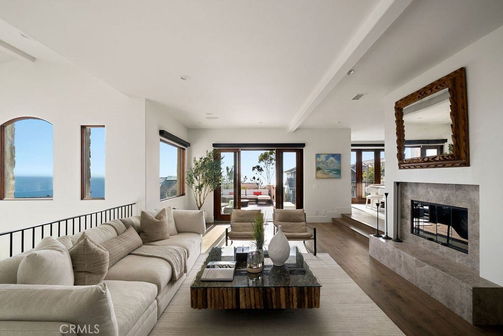 Living room fireplace and ocean view at 740 Bolsana Drive, Laguna Beach