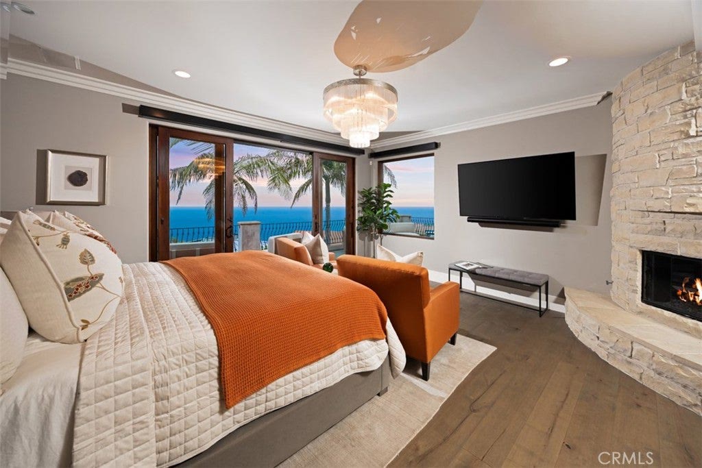 Primary suite with fireplace and ocean view at 740 Bolsana Drive, Laguna Beach