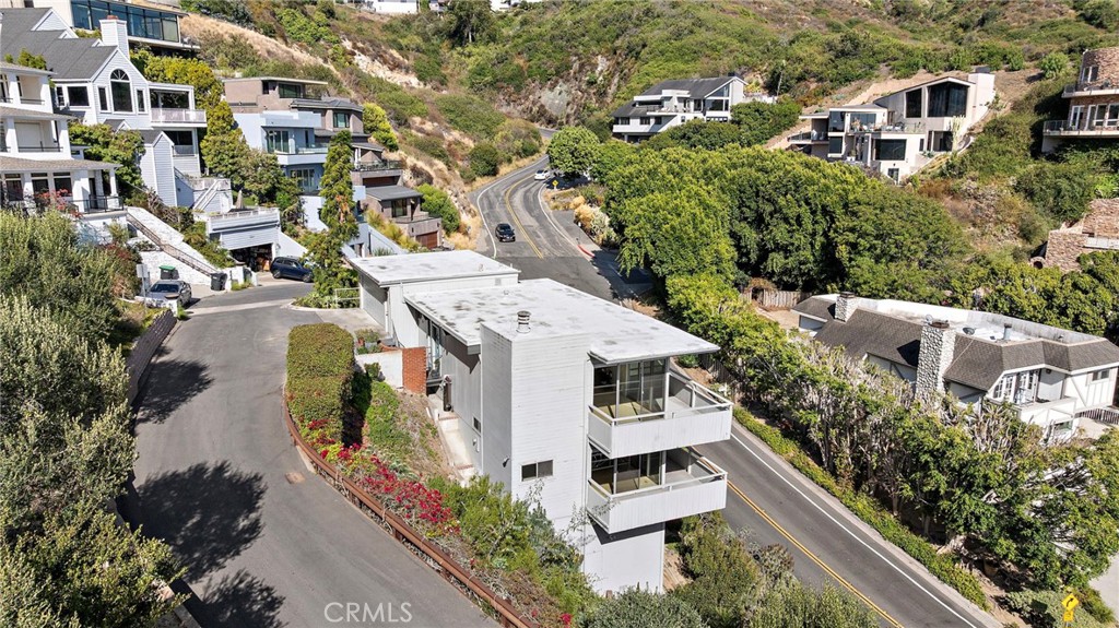 Aerial view of the corner lot between two streets at 888 Summit Drive, Laguna Beach