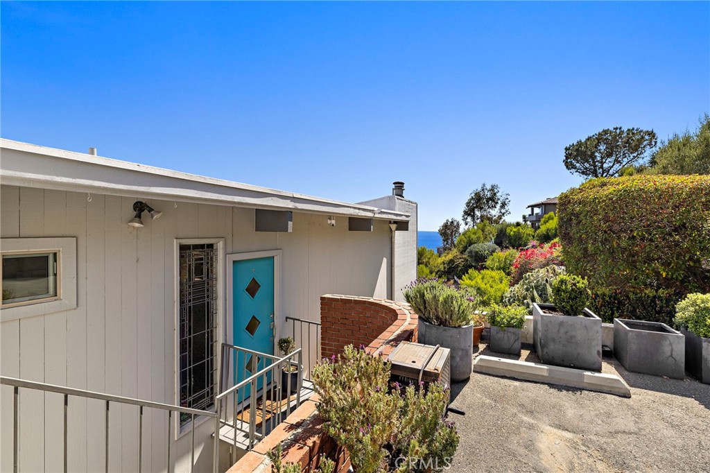 Entry walk to the front door at 888 Summit Drive, Laguna Beach