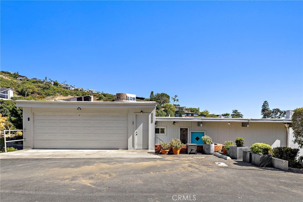 Garage and driveway at the street entry at 888 Summit Drive, Laguna Beach
