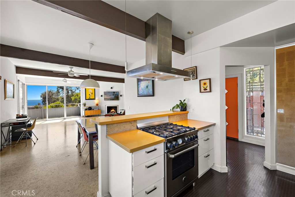 Kitchen breakfast bar looking toward the living room at 888 Summit Drive, Laguna Beach